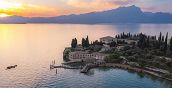 Gruppo in volo esclusivo sopra il Lago di Garda in elicottero